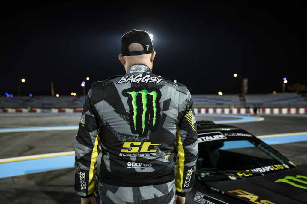 Man getting into race car