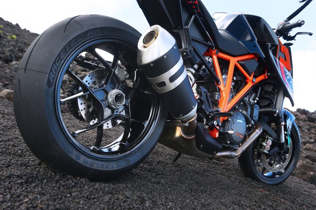 KTM Single swing arm bike on gravel