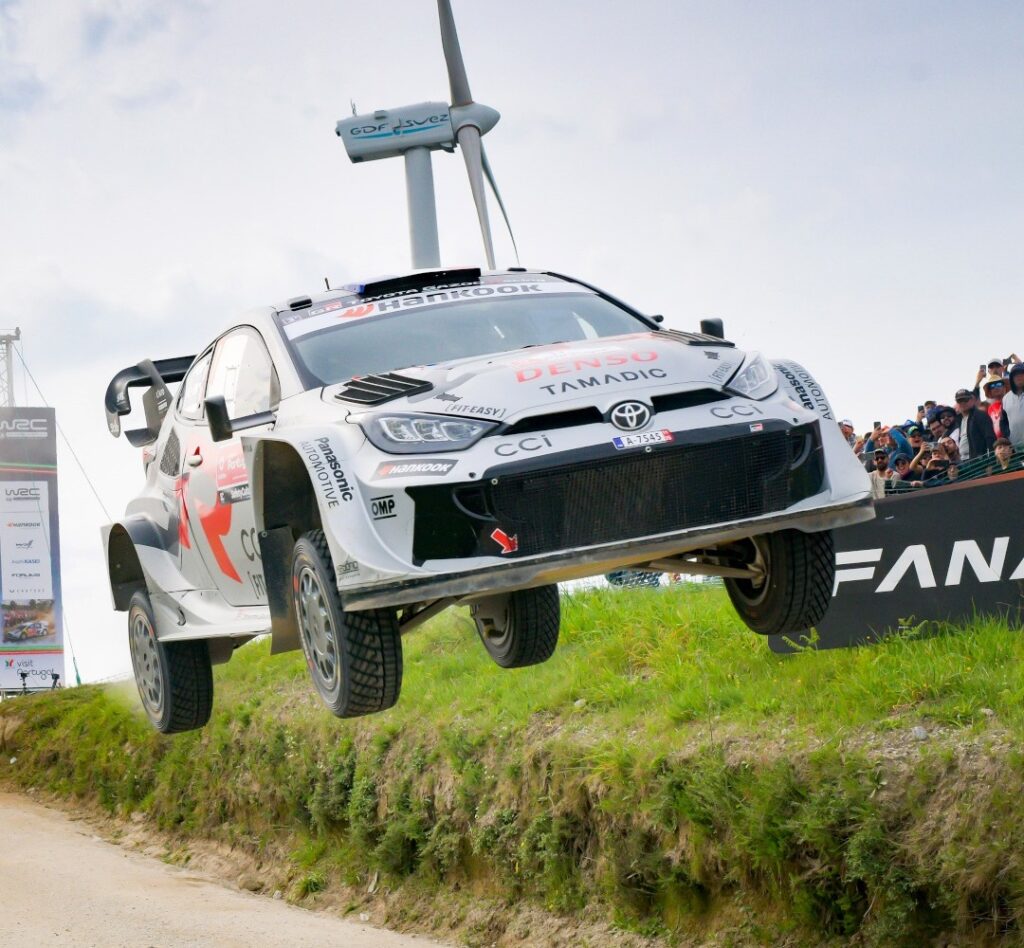 Silver Toyota Yaris performing a jump.
